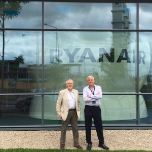 Learmount (L) and Capt Andy O'Shea in front of Ryanair's Dublin training centre, the new Controlled Training simulator visible through the glass